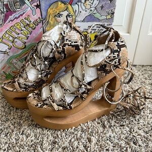 Jeffrey Campbell Tan and Black Snake Print Lace up Wood Heel Platforms